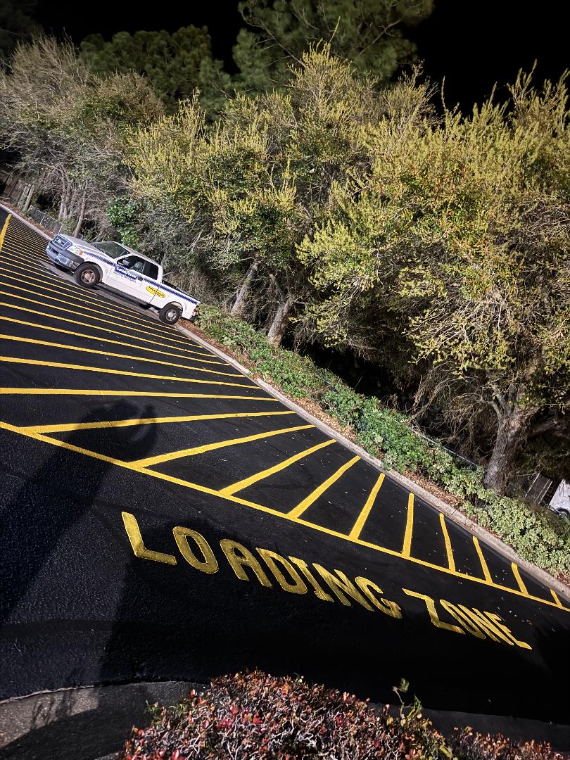Complete Parking Lot Restoration: Asphalt Repairs, Crack Filling, Seal Coating & Striping Completed by Brynco Home Improvements in Navarre, FL